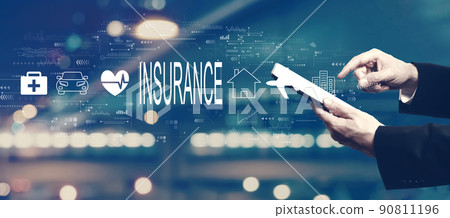 Insurance concept with businessman using a tablet 90811196