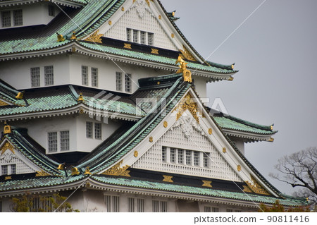 Osaka Castle in Japan Spring Osaka Castle Close-up photo of the castle tower Beautiful exterior and decoration of the castle Osaka Castle in Japan Spring Osaka Castle Close-up photo of the castle tower Beautiful exterior and decoration of the castle 90811416