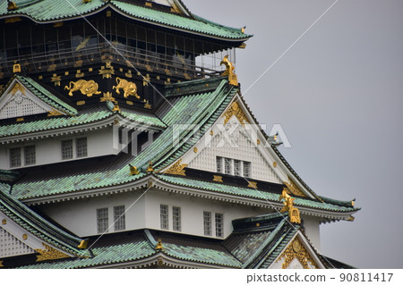 Osaka Castle in Japan Spring Osaka Castle Close-up photo of the castle tower Beautiful exterior and decoration of the castle Osaka Castle in Japan Spring Osaka Castle Close-up photo of the castle tower Beautiful exterior and decoration of the castle 90811417