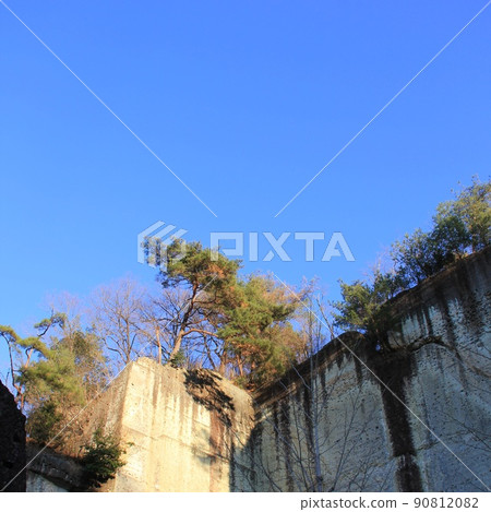 Artificially cut out landscape of a hill with trees Artificially cut out landscape of a hill with trees 90812082