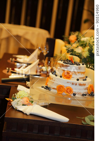 Wedding cake for a wedding reception waiting for the bride and groom's cake Wedding cake for a wedding reception waiting for the bride and groom's cake 90814960