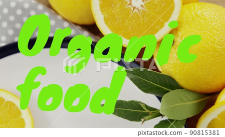 Digital composite of lemons with plate on table and organic food text, copy space Digital composite of lemons with plate on table and organic food text, copy space 90815381