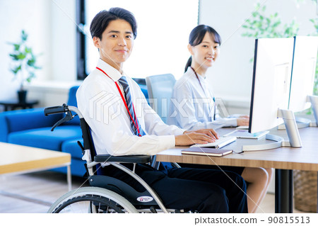 Young man in a wheelchair with a disability 90815513