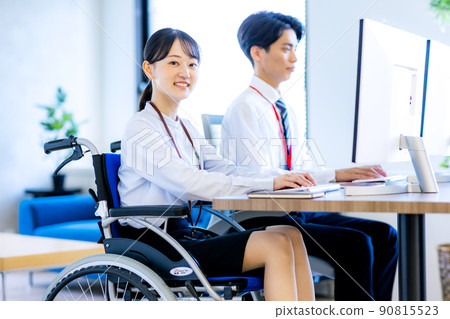 Young woman sitting on wheelchair Young woman sitting on wheelchair 90815523