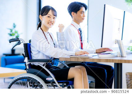 Young woman sitting on wheelchair Young woman sitting on wheelchair 90815524