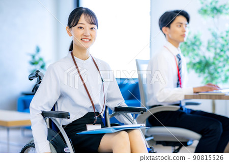 Young woman sitting on wheelchair 90815526