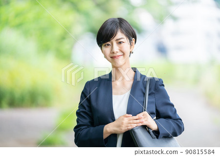 Female business woman in a suit Female business woman in a suit 90815584