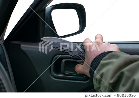 knife in the hand of a man who opens a car door knife in the hand of a man who opens a car door 90816050