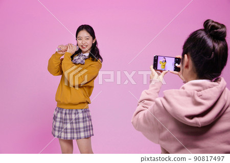 mz generation, asian girl students who shoot short forms photos images 90817497