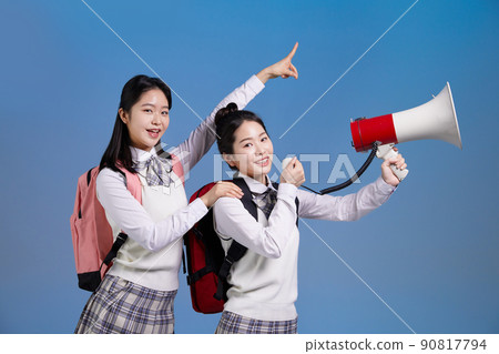 mz generation, asian girl students holding a loudspeaker photo image 90817794