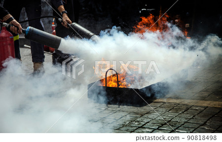 practice Firefighters fighting a fire operation with high pressure portable practice Firefighters fighting a fire operation with high pressure portable 90818498