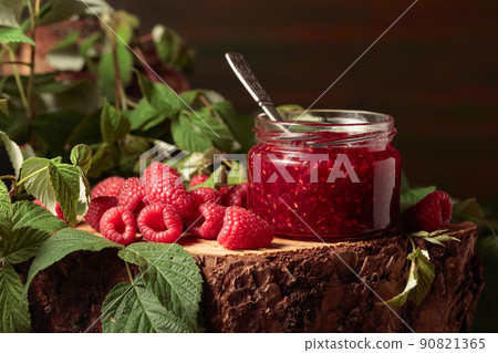 Raspberry jam and fresh berries. 90821365