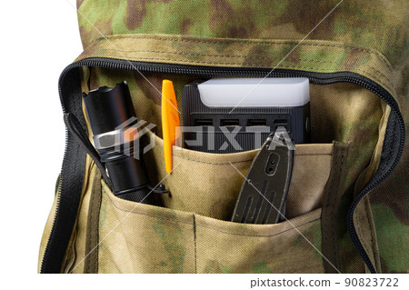 Open military backpack of khaki color on a white background Open military backpack of khaki color on a white background 90823722