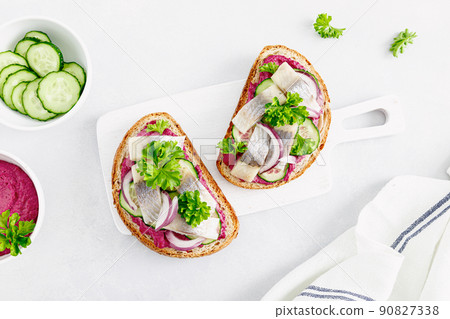 Sandwiches, toasts with salted herring and beetroot pate, top view 90827338