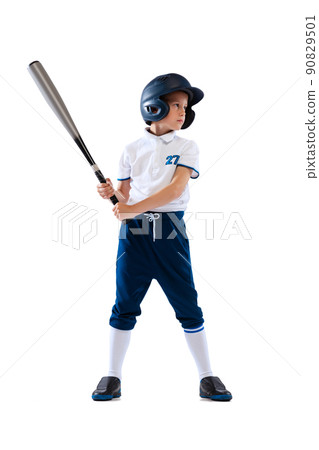 Little boy, baseball player, pitcher in blue-white uniform training isolated on white studio background. Concept of sport, achievements, studying, competition. 90829501