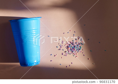 Microplastics small pieces of hard plastic, intended for further processing. Global ocean pollution. Microplastics small pieces of hard plastic, intended for further processing. Global ocean pollution. 90831170