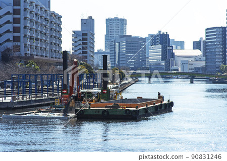 Dredging work: Dredging vessel to scoop up the sediment of the canal 90831246