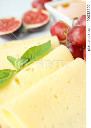 Concept of cooking eating with hard cheese, close up Concept of cooking eating with hard cheese, close up 90832292