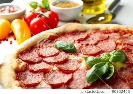 Concept of tasty food with Salami pizza, close up 90832406