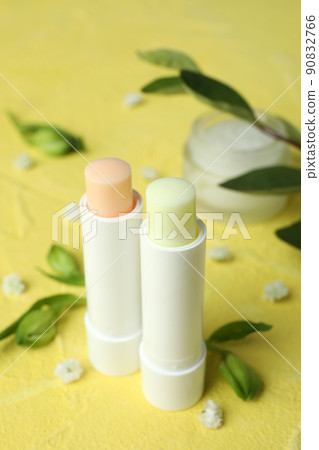 Concept of eco face care cosmetic on yellow textured background Concept of eco face care cosmetic on yellow textured background 90832766