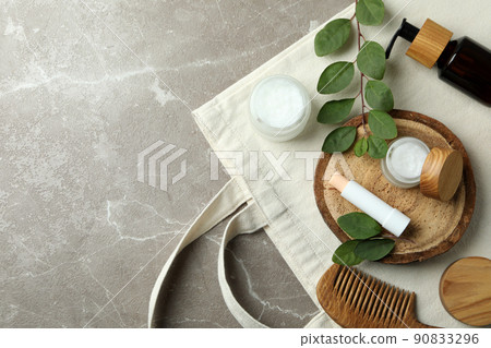 Concept of eco face care cosmetic on gray textured background 90833296