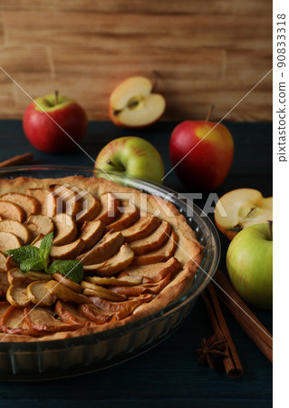 Concept of tasty food with apple pie on wooden table 90833318