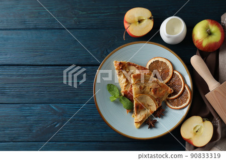 Concept of tasty food with apple pie on wooden background 90833319