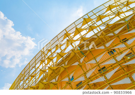 Steel structure roof of office building. Windows glass facade supported. Abstract architecture fragment background. Steel structure roof of office building. Windows glass facade supported. Abstract architecture fragment background. 90833966