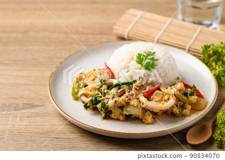 Thai stir fried curry squid and cooked rice, Thai food 90834070
