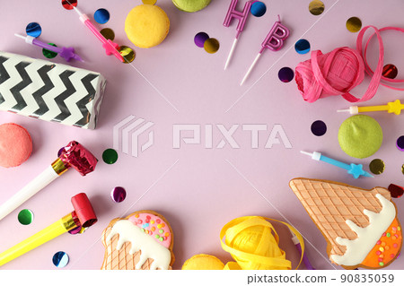 Birthday accessories on light violet background, space for text Birthday accessories on light violet background, space for text 90835059