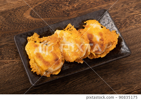 Grilled bamboo fish paste with crispy cheese 90835175