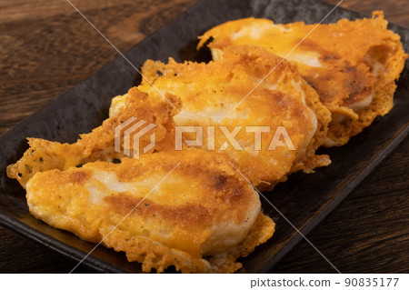 Grilled bamboo fish paste with crispy cheese Grilled bamboo fish paste with crispy cheese 90835177