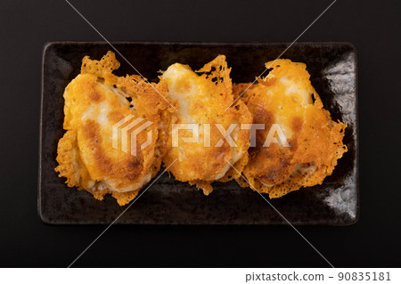 Grilled bamboo fish paste with crispy cheese 90835181