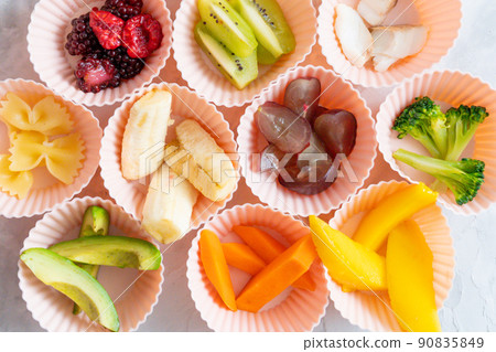 BLW Baby-Led Weaning concept - sliced foods, top view 90835849