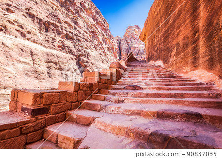 Petra, Jordan - Rocky stairs to view point over Treasury 90837035