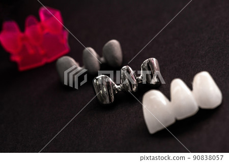 Teeth implant and crown installation process parts isolated on a black background. Medically accurate 3D model.  90838057