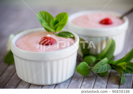 sweet curd mass whipped with fresh strawberries in a bowl sweet curd mass whipped with fresh strawberries in a bowl 90838186