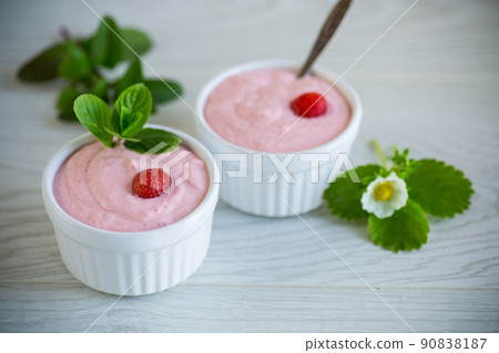 sweet curd mass whipped with fresh strawberries in a bowl sweet curd mass whipped with fresh strawberries in a bowl 90838187