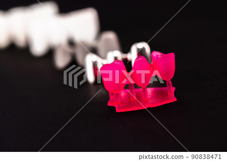 Teeth implant and crown installation process parts isolated on a black background. Medically accurate 3D model.  90838471