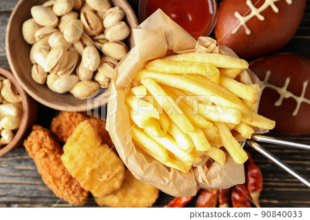 Concept of Super bowl snacks on dark background Concept of Super bowl snacks on dark background 90840033