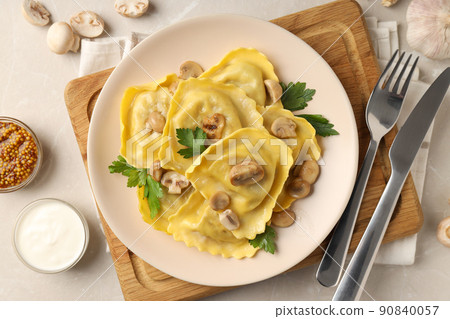 Delicious food concept with ravioli on textured table 90840057
