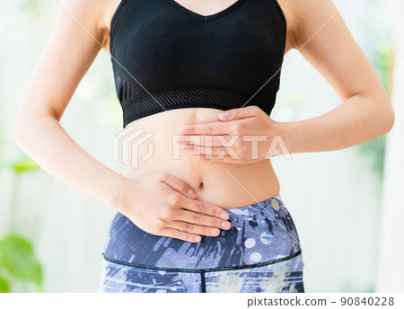 A woman (parts) to check the condition of her stomach 90840228