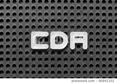 White alphabet letter in word CDA (Abbreviation of Confidential disclosure agreement) on black pegboard background 90842102