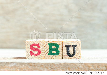 Alphabet letter block in word SBU (Abbreviation of Strategic business unit) on wood background Alphabet letter block in word SBU (Abbreviation of Strategic business unit) on wood background 90842164