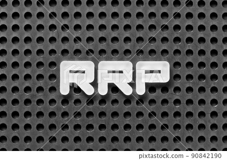 White alphabet letter in word RRP (Abbreviation of recommended retail price) on black pegboard background 90842190