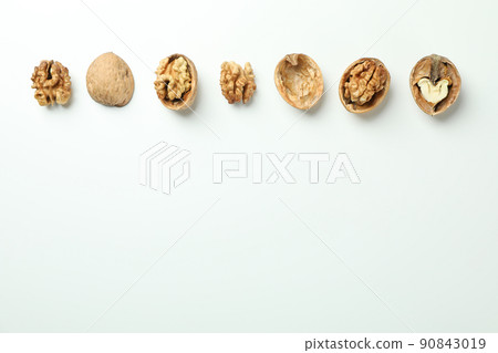 Flat lay composition with walnuts on white background 90843019