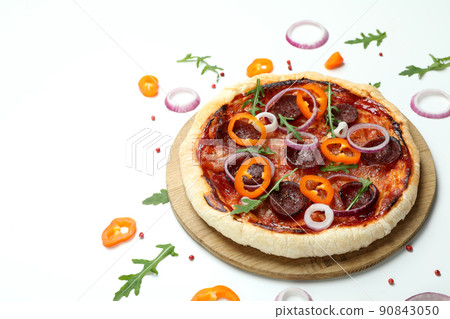 Concept of tasty food with Salami pizza on white background 90843050