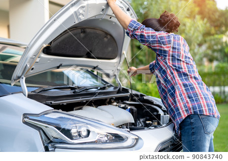 Open hood mechanic engine system to check and repair damage car crash. Open hood mechanic engine system to check and repair damage car crash. 90843740