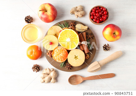 Ingredients for cooking mulled wine on white wooden background 90843751