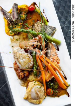 Appetizing sea food dish on a white plate 90844905